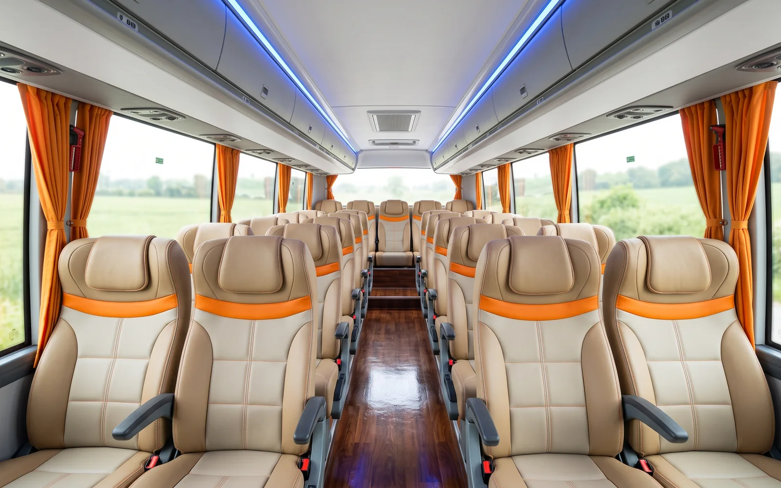 Mini Bus (Zhongtong) cabin: tan leather two-by-two seats with orange trim, orange curtains and a blue-lit ceiling